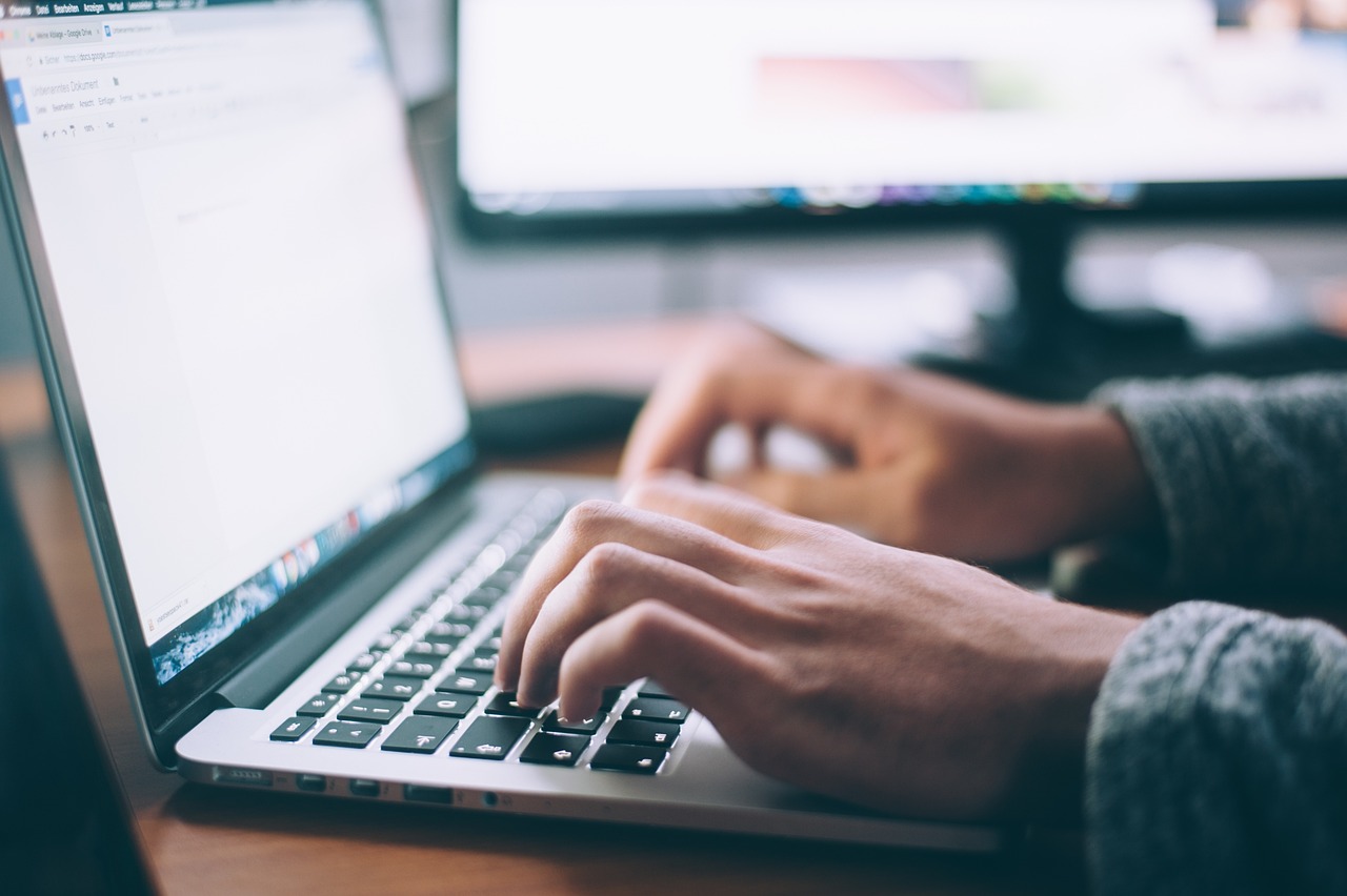 Laptop, apple, keyboard — Secure Your Accounts with US SMS Receive Services